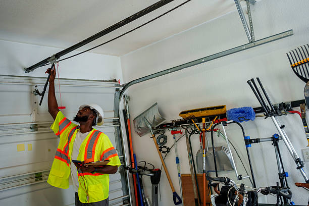 Professional Garage Door Spring Repair technician working in Paw Paw, MI